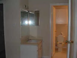 a bathroom with a sink and shower