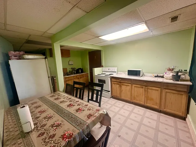 a bed room with a bed and a table