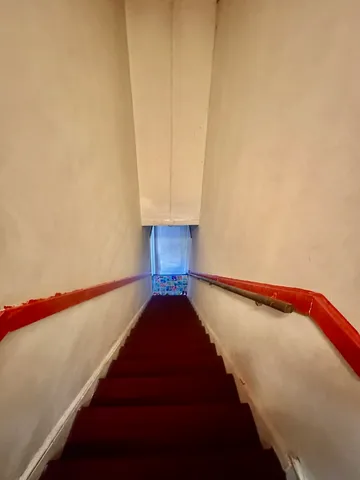 a kitchen with a refrigerator a stove top oven a sink and dishwasher