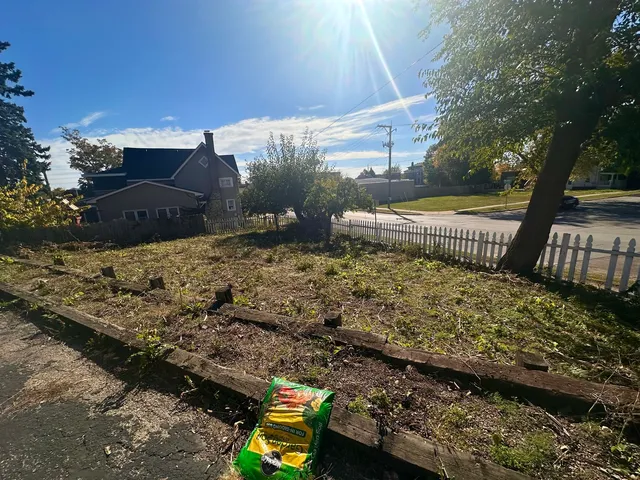 a front view of a house with parking yard
