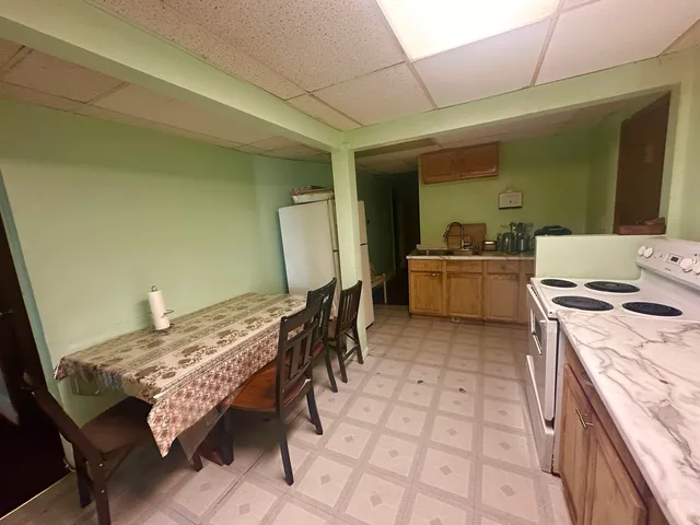 a bed room with a bed and furniture