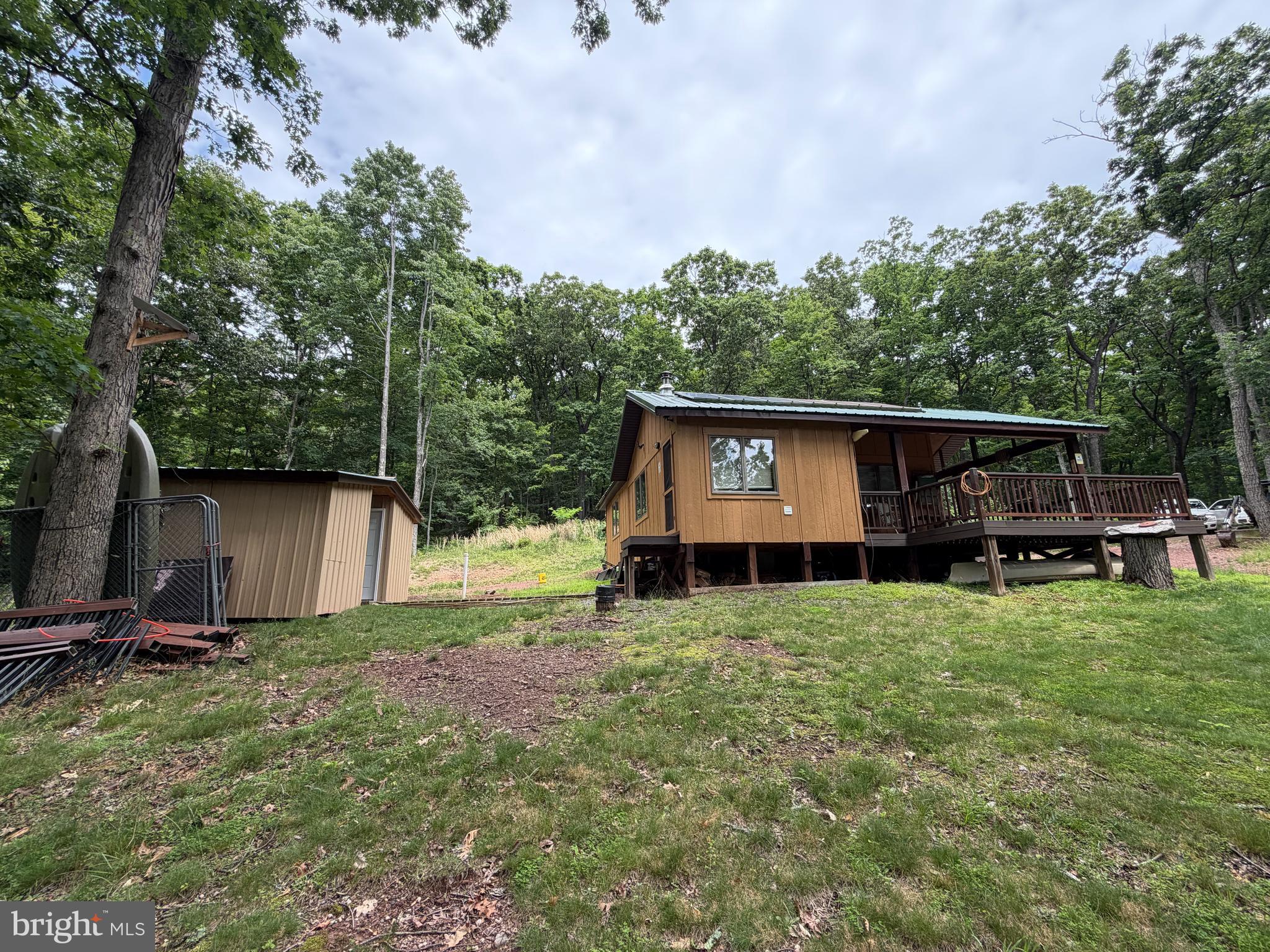 1419 Paul's Woods Road Delray, WV 26714 - Photo 12 of 105 a view of a house with backyard and porch