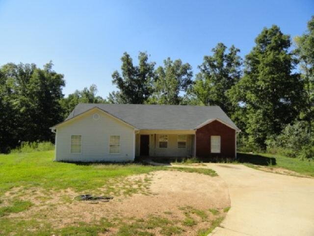 110 Usher Road Covington, GA 30016 - Photo 1 of 1 a view of a house with a yard