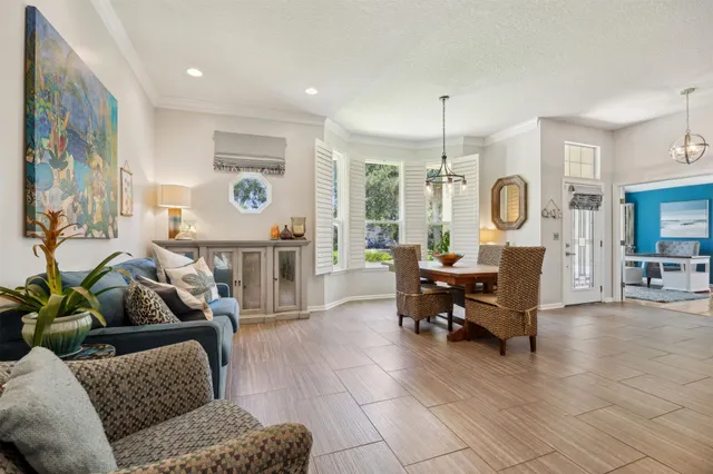 a living room with furniture and windows