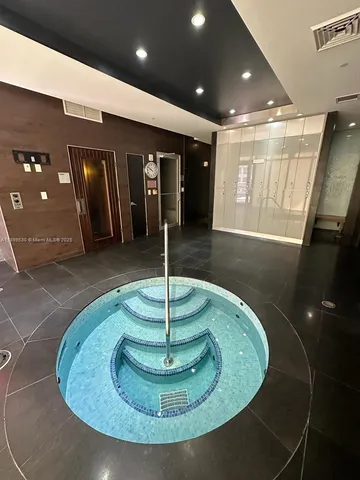 a view of a lobby with a chandelier