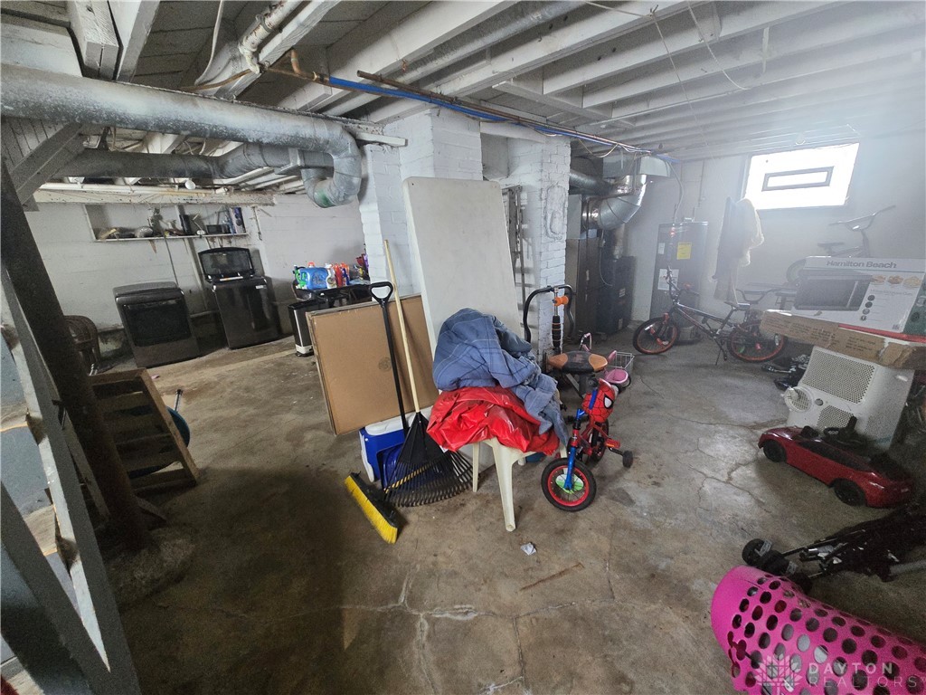 355 Elmhurst Road Dayton, OH 45417 - Photo 14 of 19 This spacious basement offers ample storage potential.