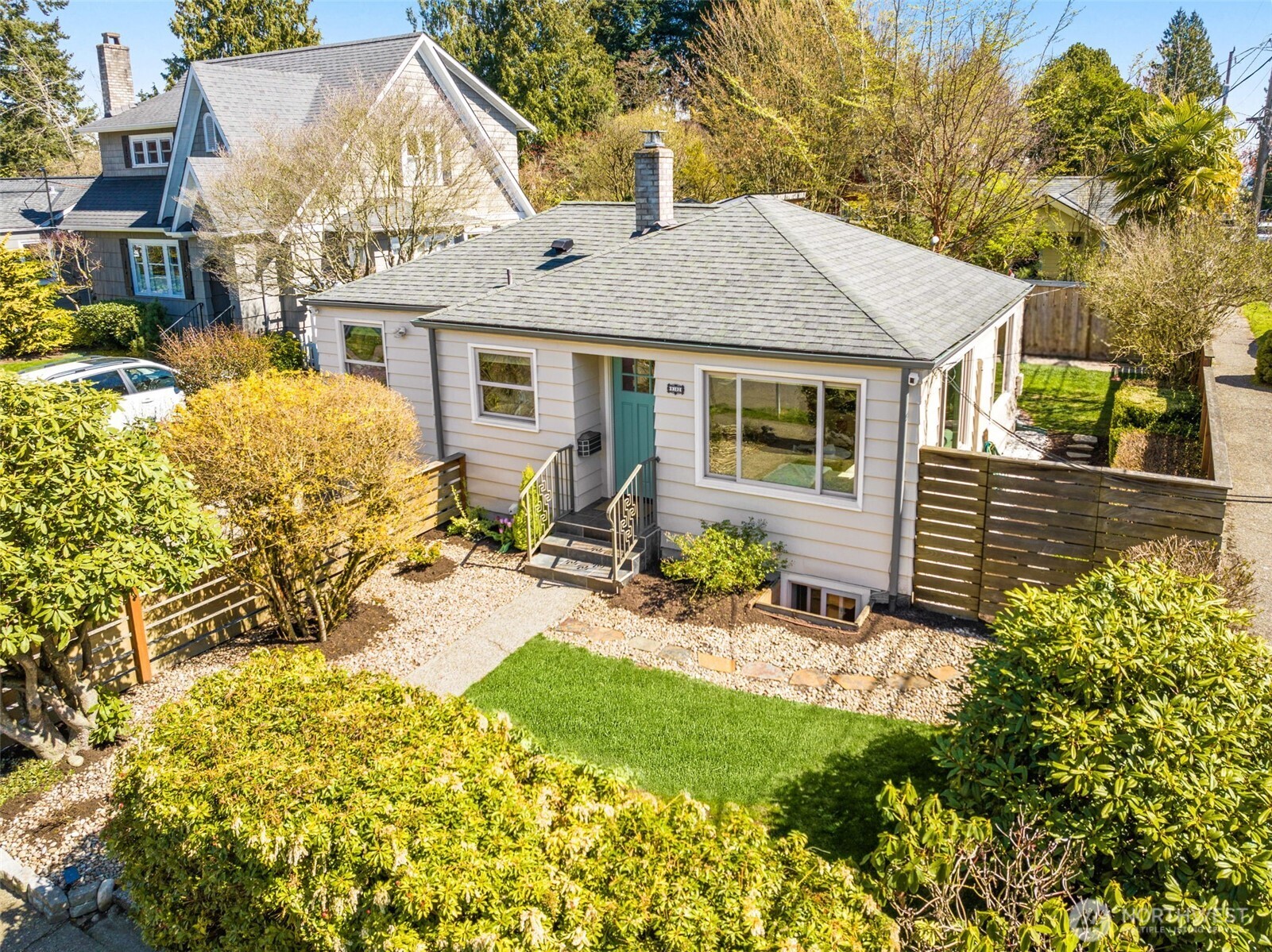 9102 12th Avenue Northeast Seattle, WA 98115 - Photo 2 of 33 front view of a house with a yard