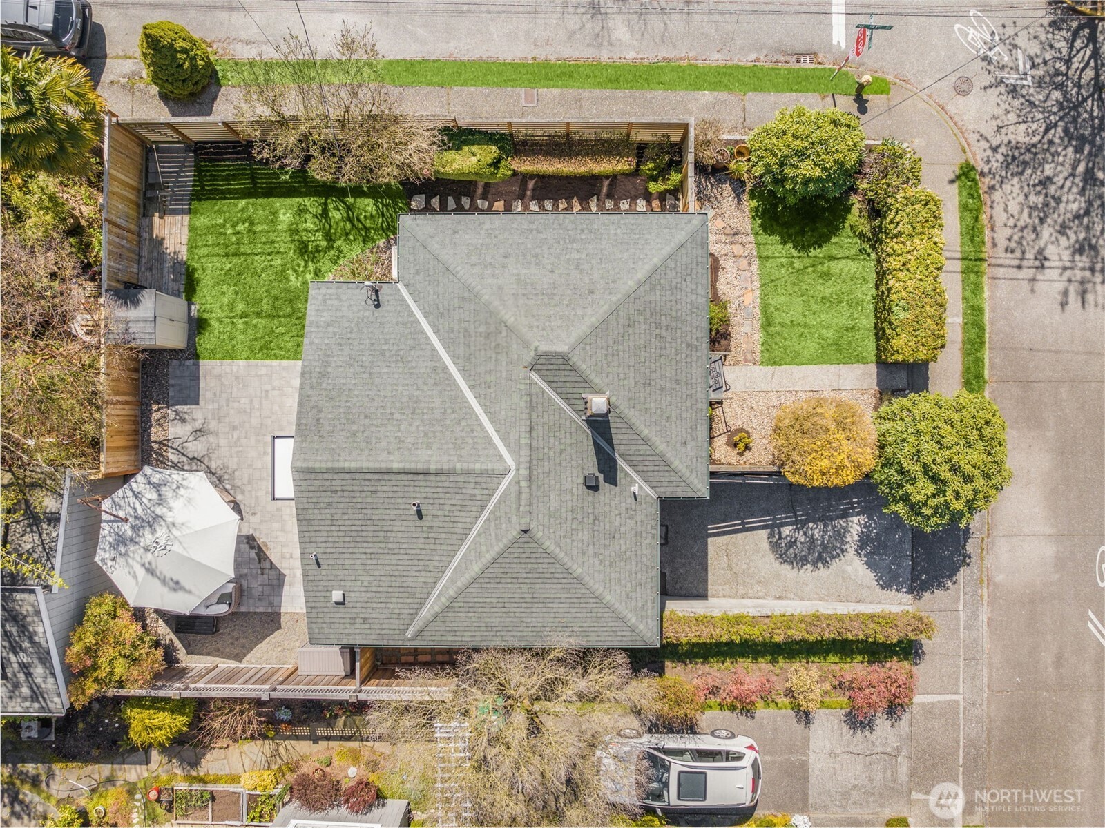 9102 12th Avenue Northeast Seattle, WA 98115 - Photo 28 of 33 an aerial view of a house with a yard