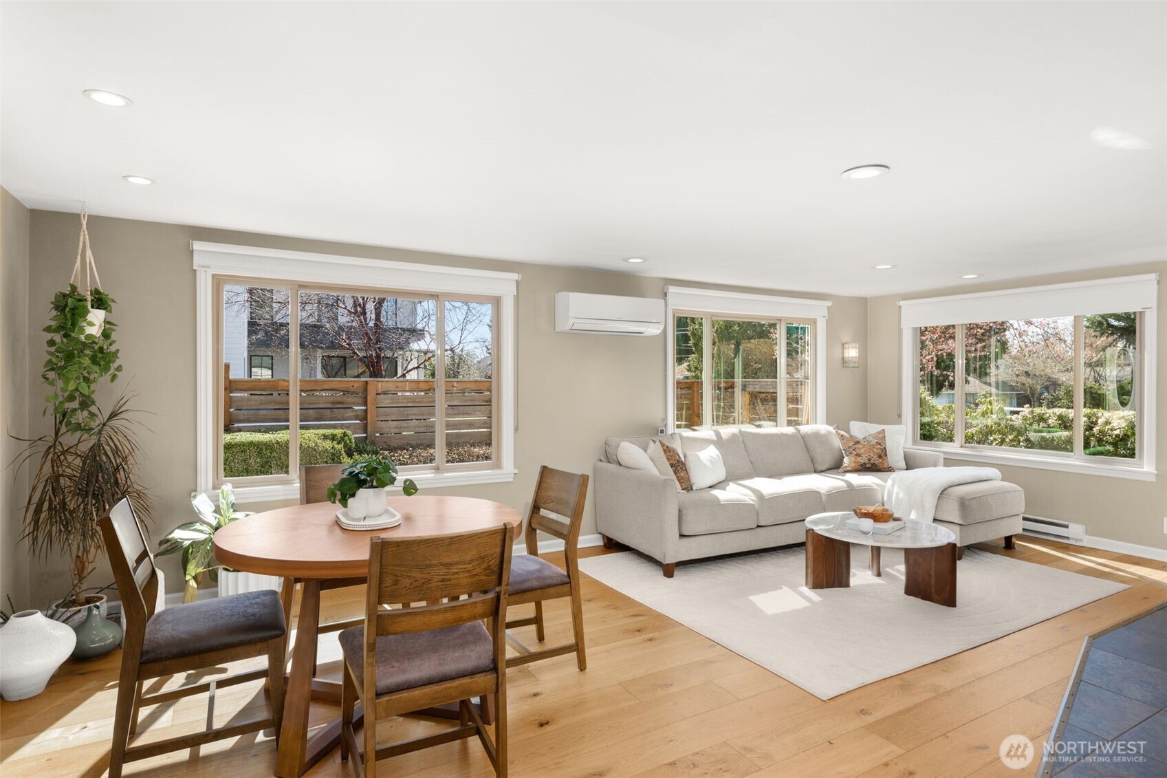 9102 12th Avenue Northeast Seattle, WA 98115 - Photo 3 of 33 a living room with furniture and a large window