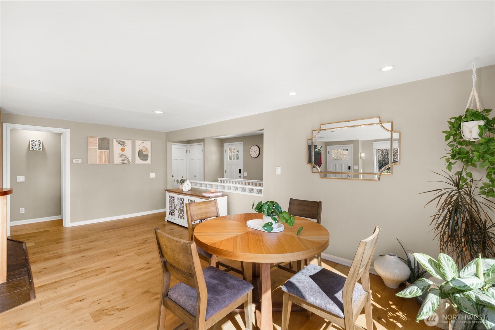 9102 12th Avenue Northeast Seattle, WA 98115 - Photo 6 of 33 a view of a dining room with furniture and wooden floor
