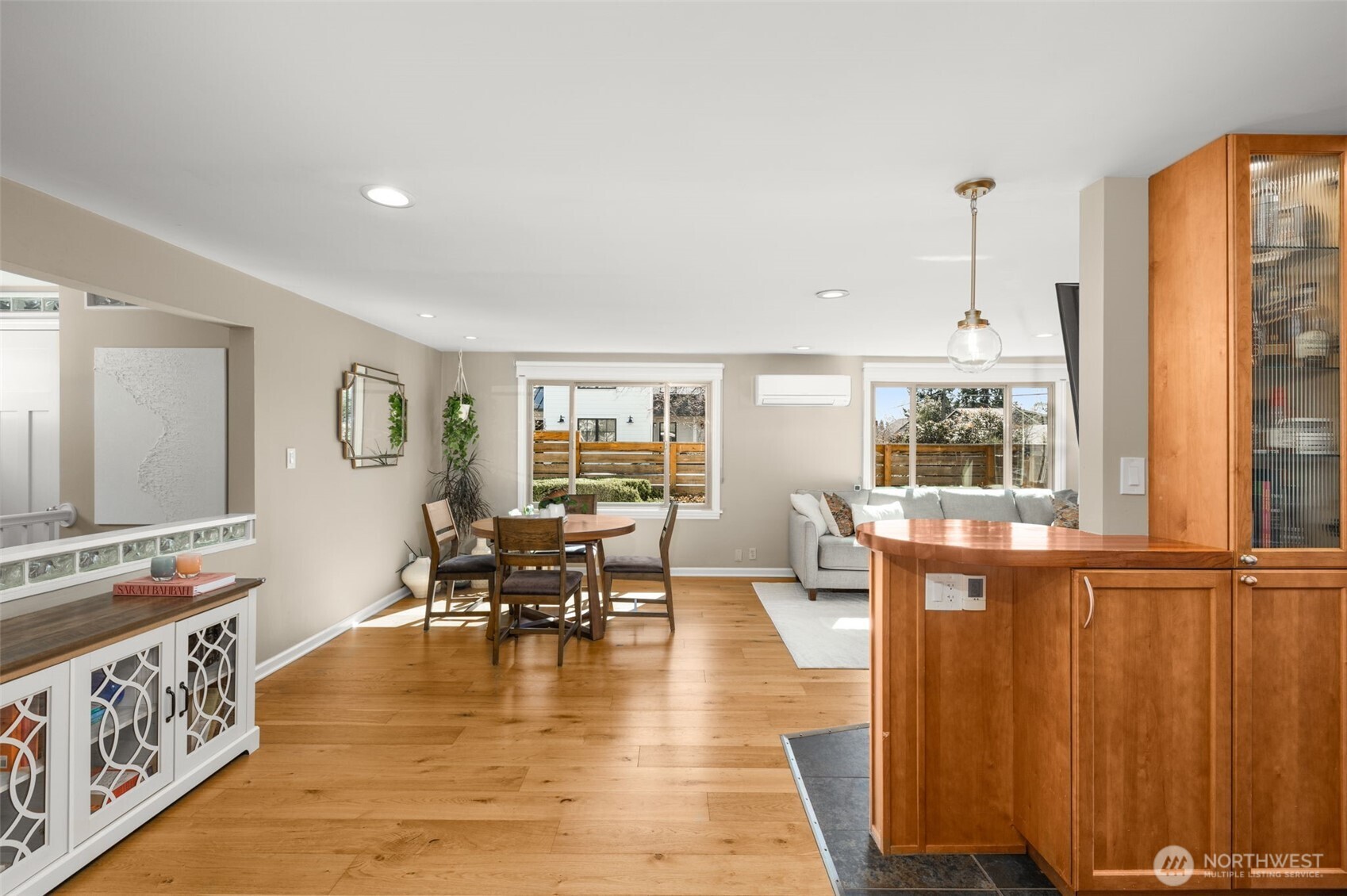 9102 12th Avenue Northeast Seattle, WA 98115 - Photo 10 of 33 a view of a living room and dining room