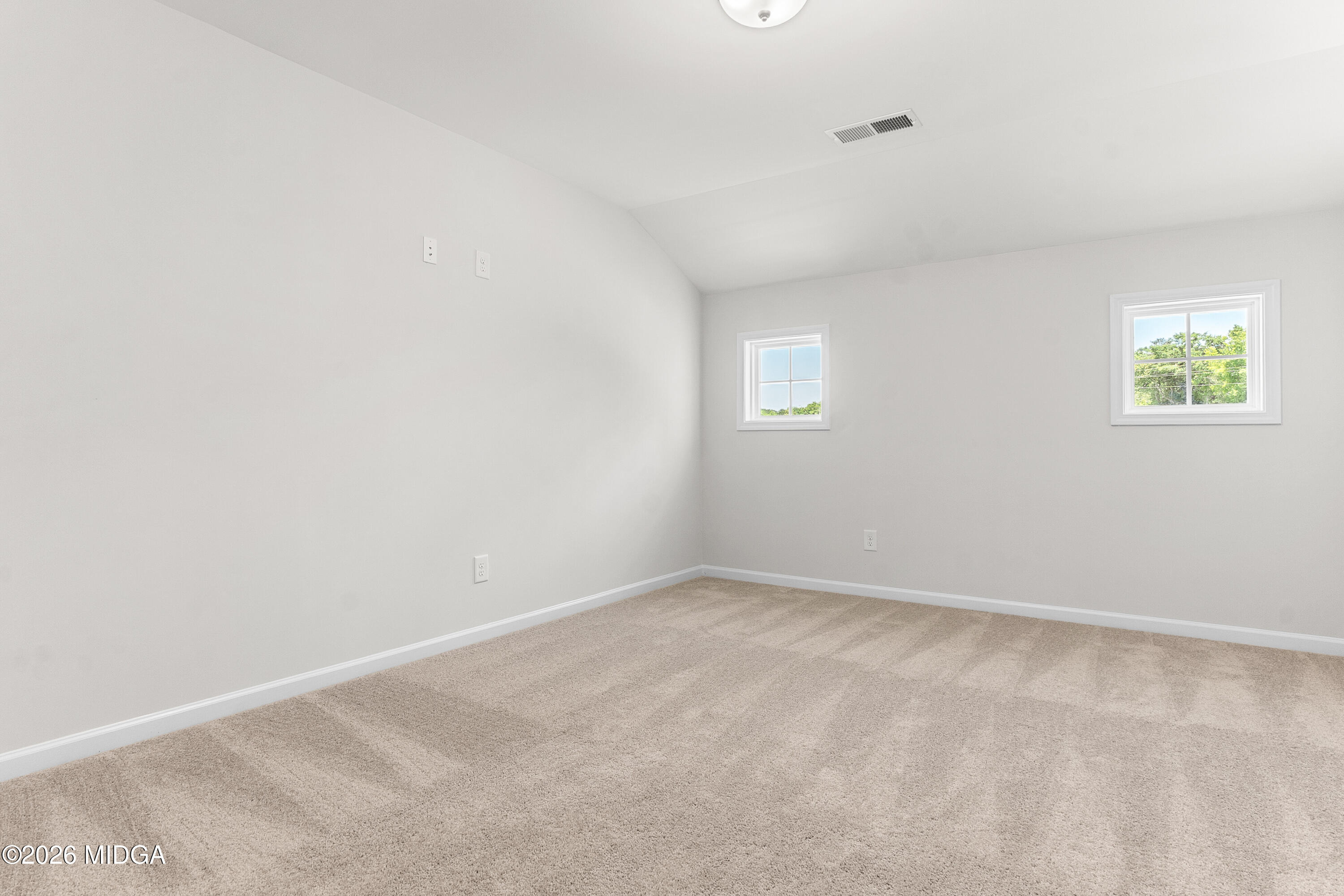 5393 Felles Way, Unit 359 Forsyth, GA 31029 - Photo 50 of 54 an empty room with a window