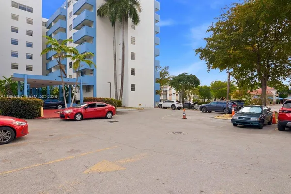 a cars parked in front of a building