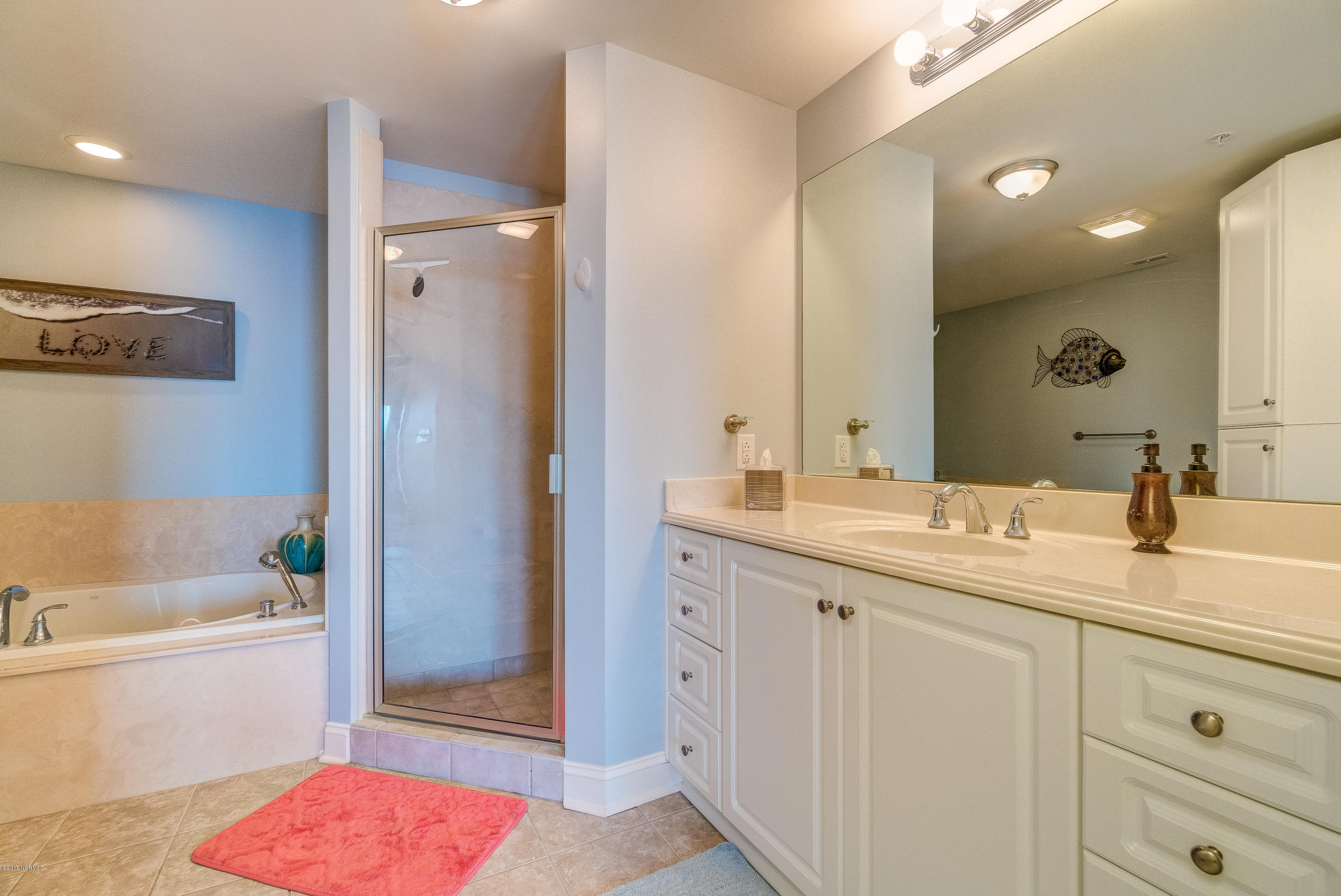 1550 Salter Path Road, Unit 206 Atlantic Beach, NC 28512 - Photo 18 of 38 Master bath with spa tub & walk in shower