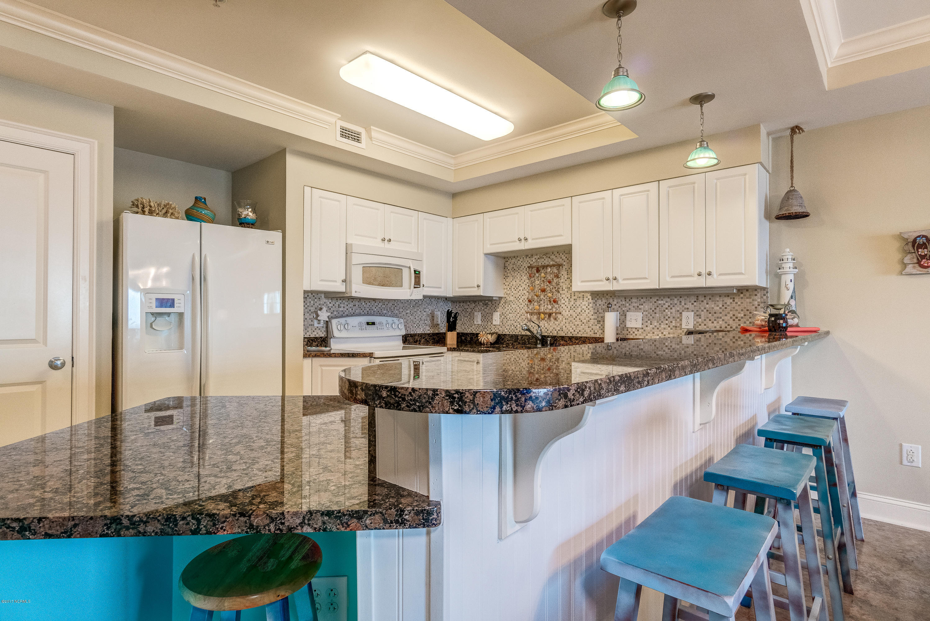 1550 Salter Path Road, Unit 206 Atlantic Beach, NC 28512 - Photo 3 of 38 Breakfast at the kitchen bar or table