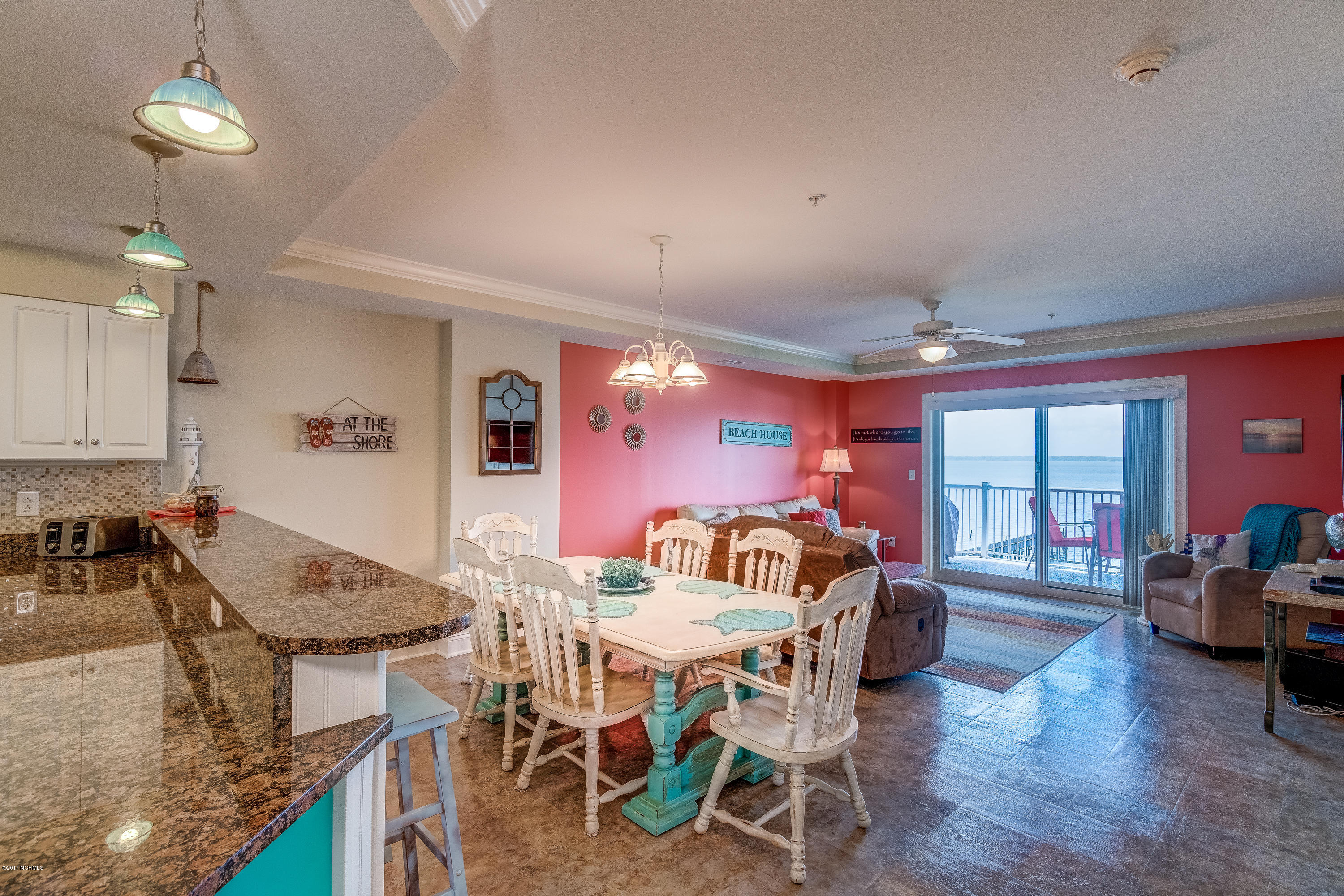 1550 Salter Path Road, Unit 206 Atlantic Beach, NC 28512 - Photo 9 of 38 Crown molding throughout the condo, ceiling fans.