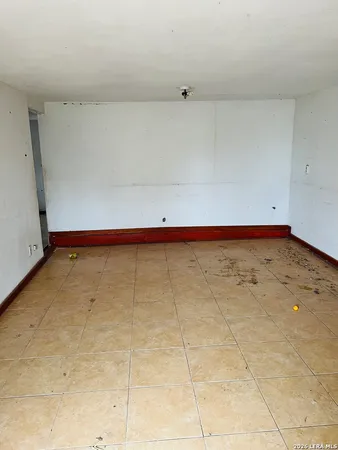 a view of a room with an empty space