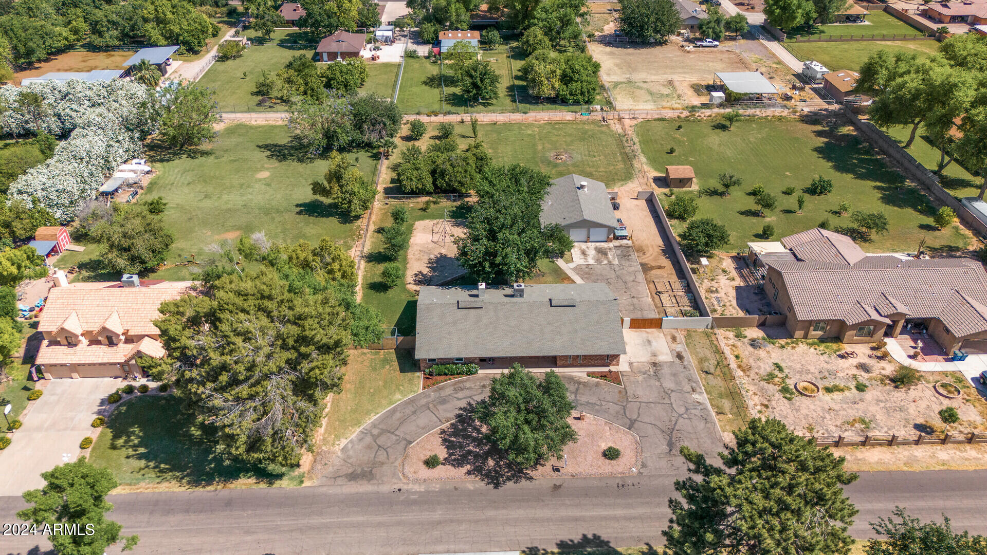 5402 West Piedmont Road Laveen, AZ 85339 - Photo 83 of 95 an aerial view of a house with a yard