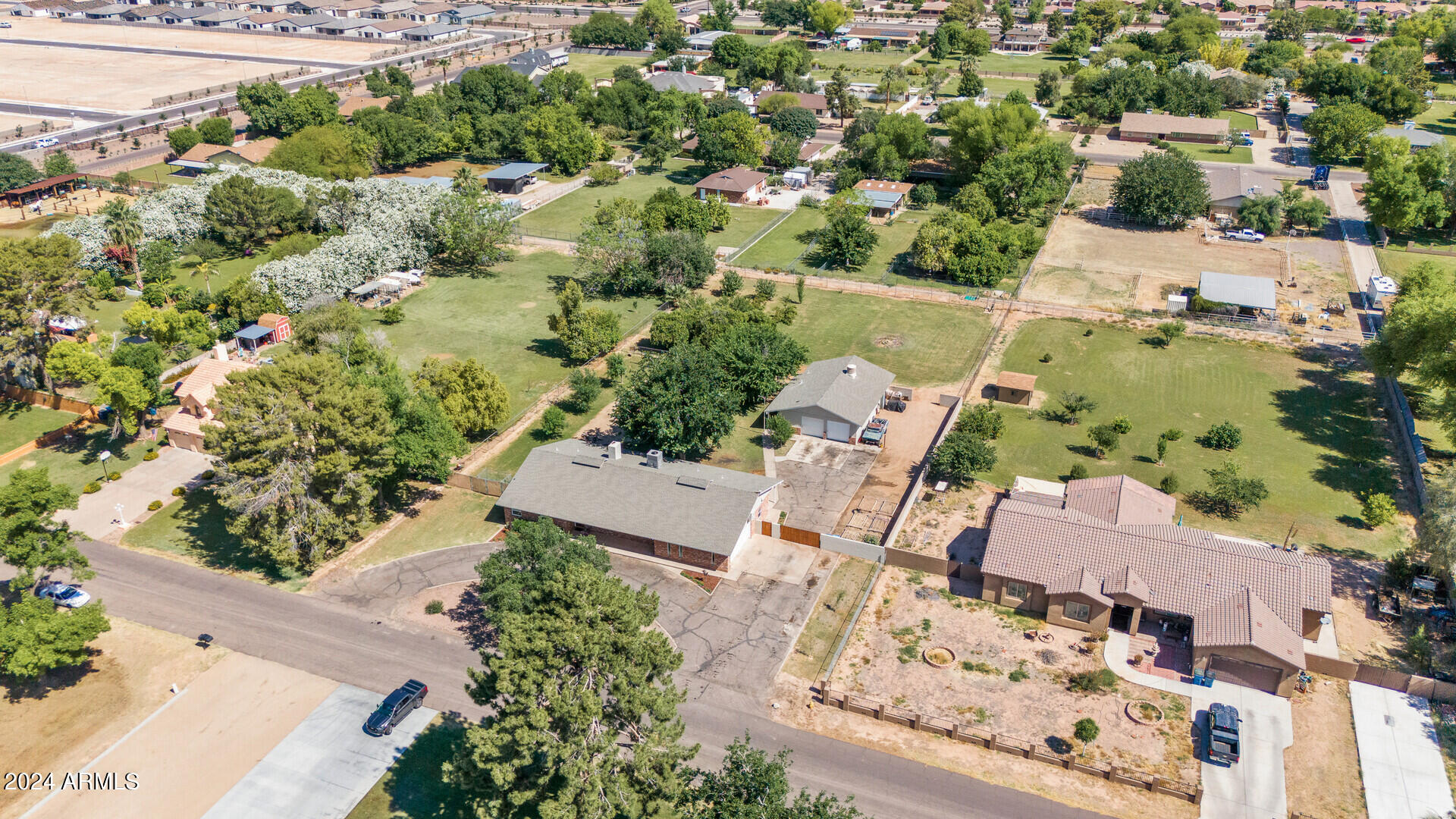 5402 West Piedmont Road Laveen, AZ 85339 - Photo 86 of 95 an aerial view of residential houses with outdoor space