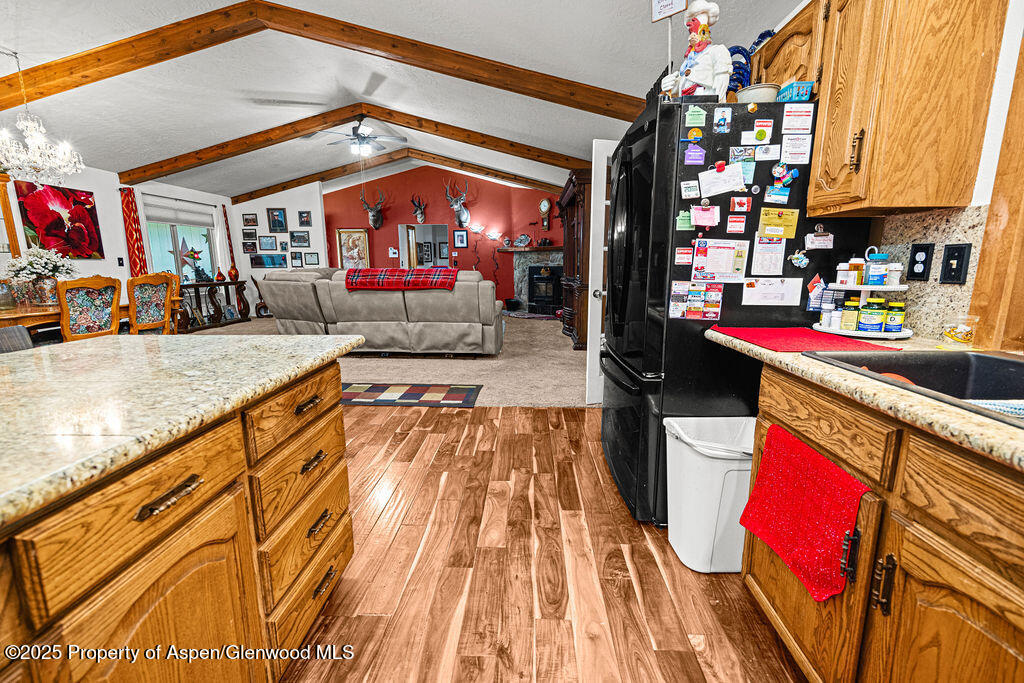 2928 Pinon Circle Craig, CO 81625 - Photo 13 of 92 a living room with furniture and a flat screen tv