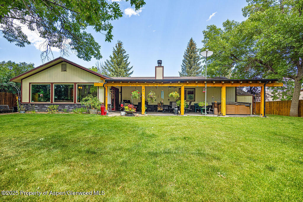 2928 Pinon Circle Craig, CO 81625 - Photo 2 of 92 a front view of a house with a yard