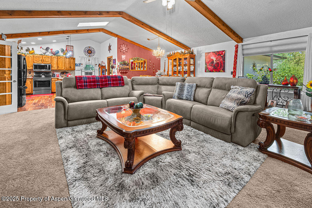 2928 Pinon Circle Craig, CO 81625 - Photo 30 of 92 a living room with furniture and a large window