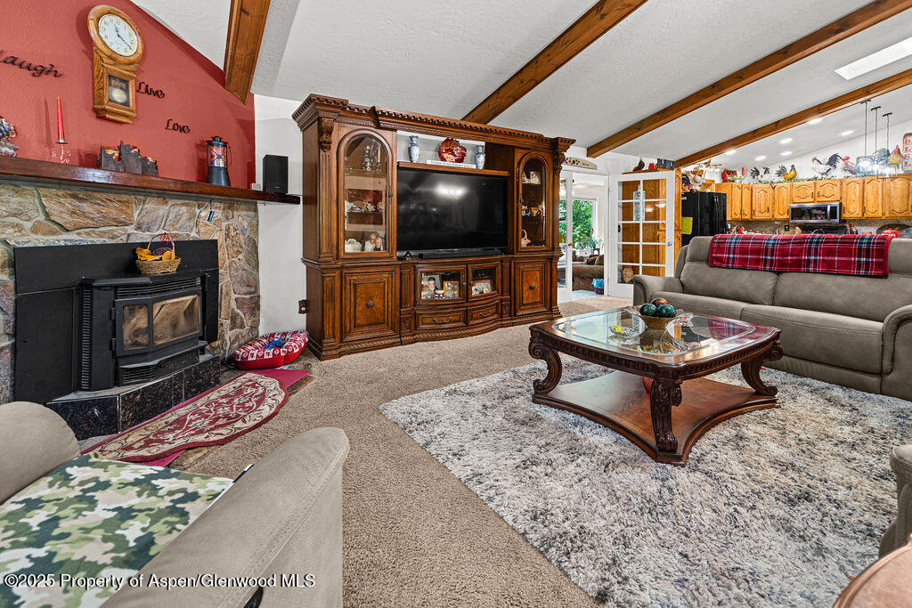 2928 Pinon Circle Craig, CO 81625 - Photo 31 of 92 a living room with furniture and a flat screen tv