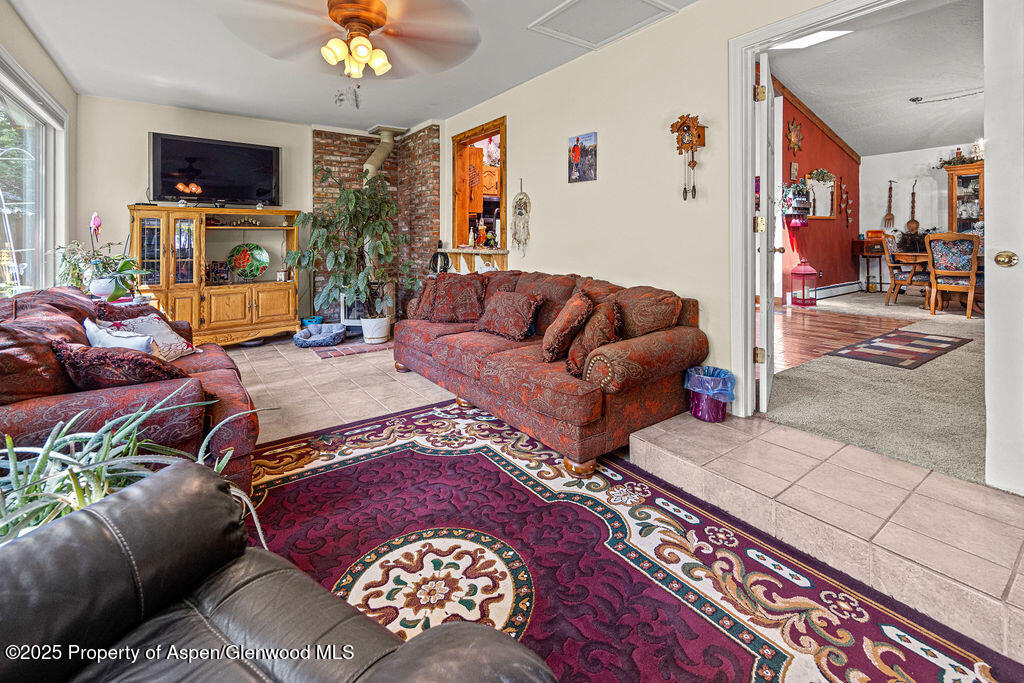 2928 Pinon Circle Craig, CO 81625 - Photo 34 of 92 a living room with furniture and a fireplace