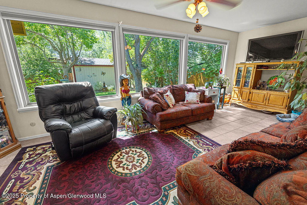 2928 Pinon Circle Craig, CO 81625 - Photo 35 of 92 a living room with furniture and a flat screen tv