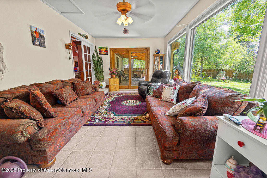 2928 Pinon Circle Craig, CO 81625 - Photo 36 of 92 a living room with furniture and a large window