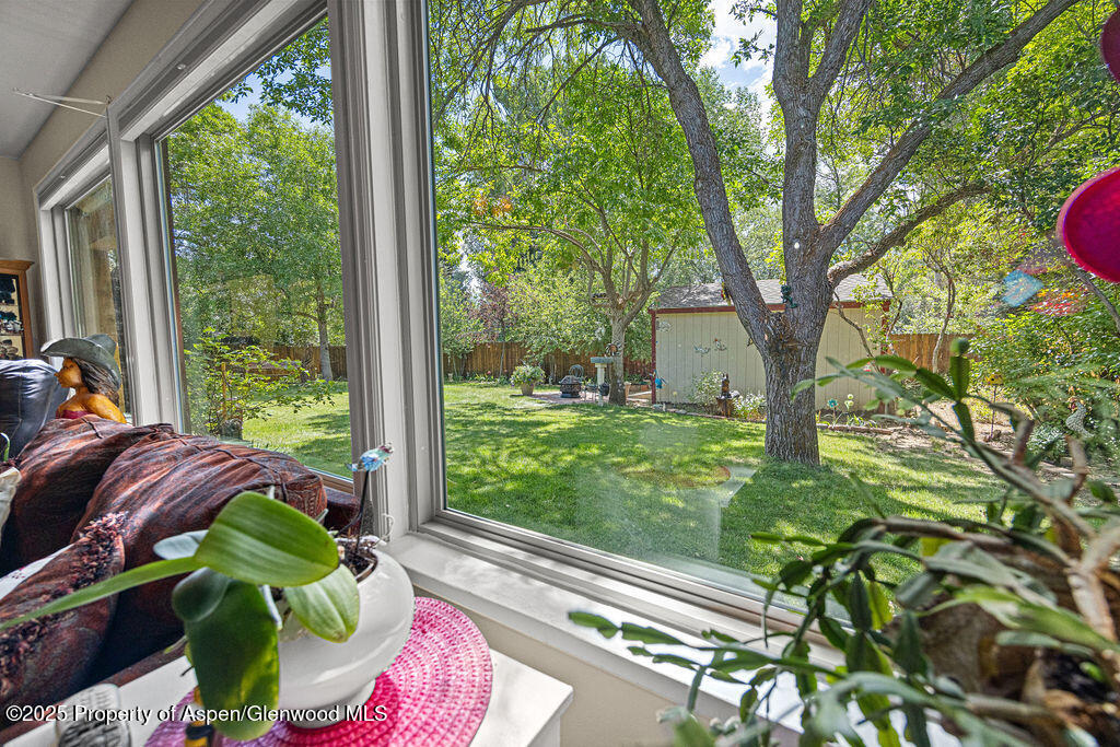 2928 Pinon Circle Craig, CO 81625 - Photo 37 of 92 a view of backyard with a deck and a garden