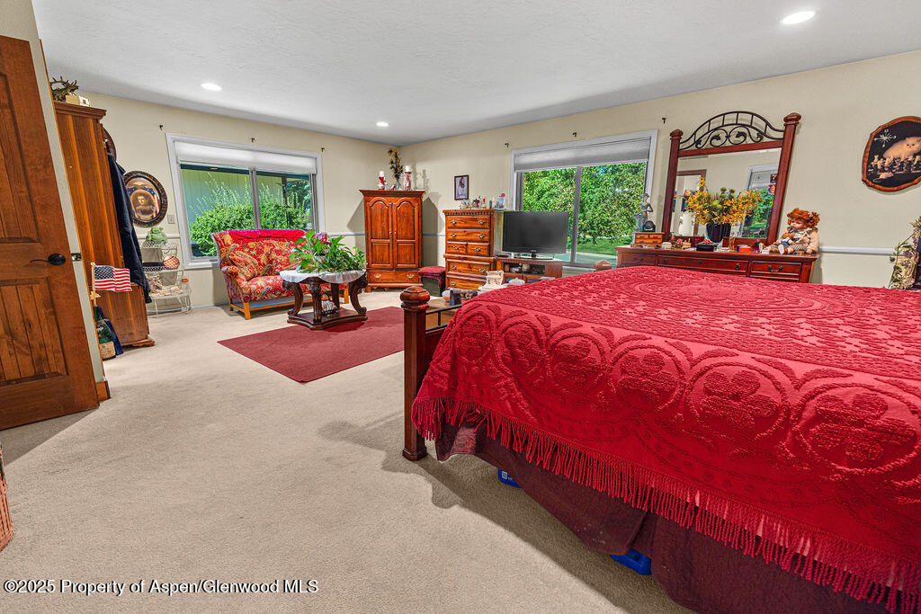 2928 Pinon Circle Craig, CO 81625 - Photo 43 of 92 a bedroom with furniture and a large window