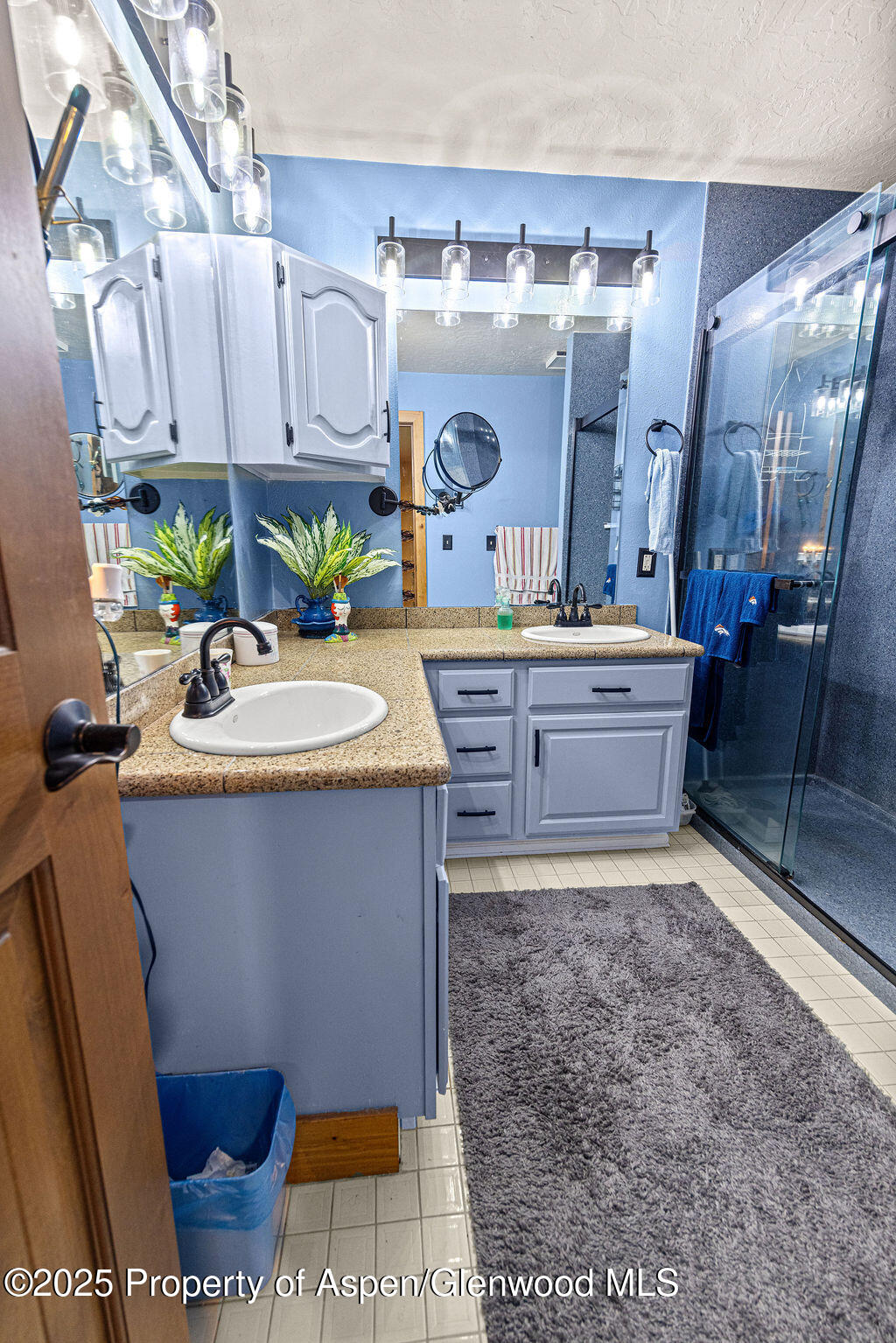 2928 Pinon Circle Craig, CO 81625 - Photo 48 of 92 a room with stainless steel appliances kitchen island granite countertop furniture a rug and a window