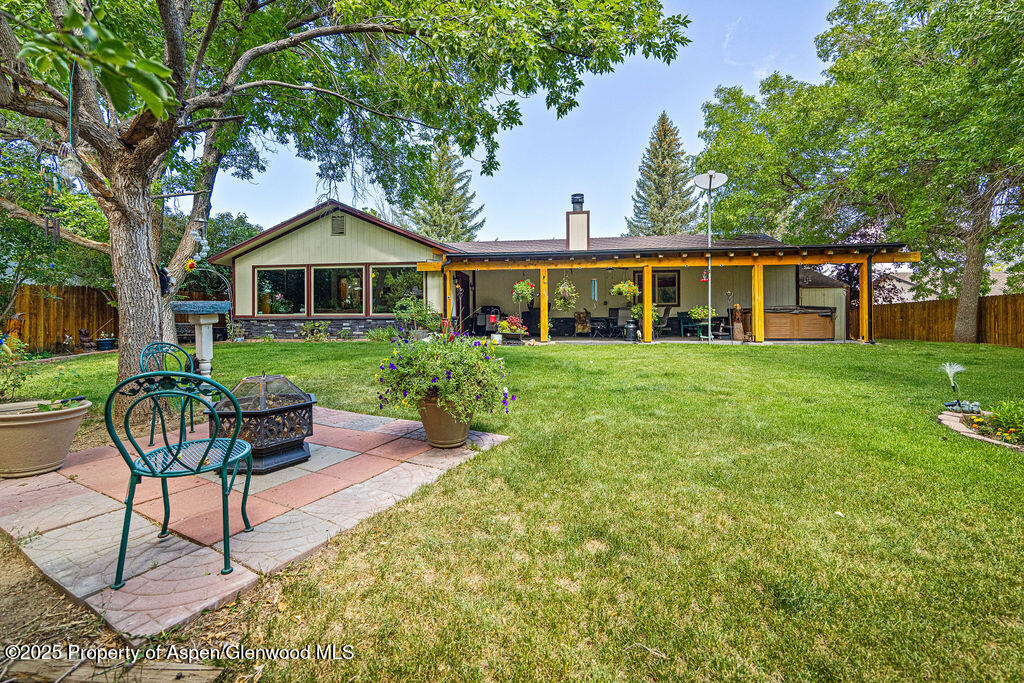 2928 Pinon Circle Craig, CO 81625 - Photo 67 of 92 a front view of a house with garden