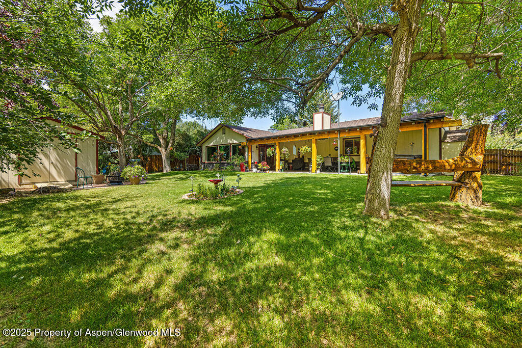 2928 Pinon Circle Craig, CO 81625 - Photo 68 of 92 a front view of a house with a yard