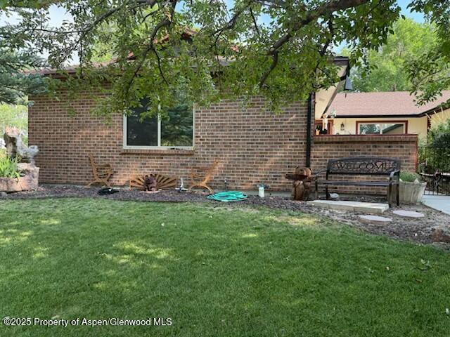 2928 Pinon Circle Craig, CO 81625 - Photo 7 of 92 a front view of a house with a yard