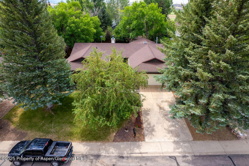2928 Pinon Circle Craig, CO 81625 - Photo 8 of 92 an aerial view of a house with garden space and a street view
