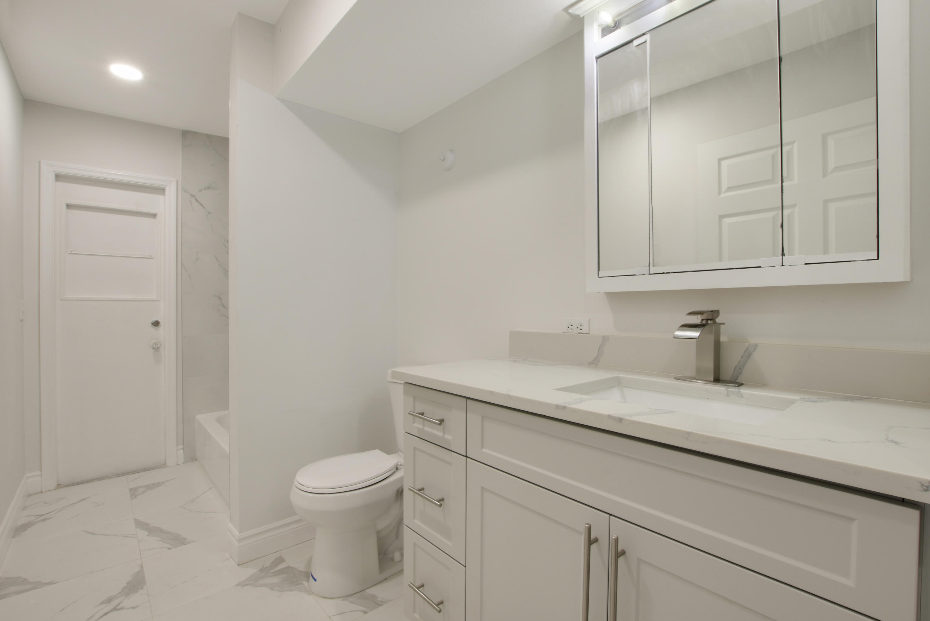 1252 Raintree Lane Wellington, FL 33414 - Photo 14 of 22 Updated Cabana Bath