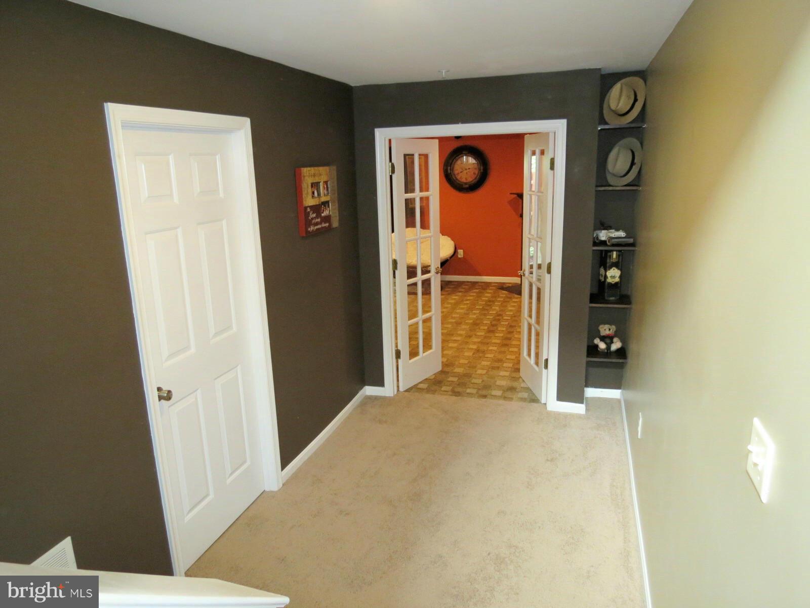 1502 Rambling Way South Frederick, MD 21701 - Photo 19 of 27 Hallway to LL Family Room