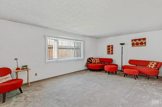 a kitchen with sink and cabinets