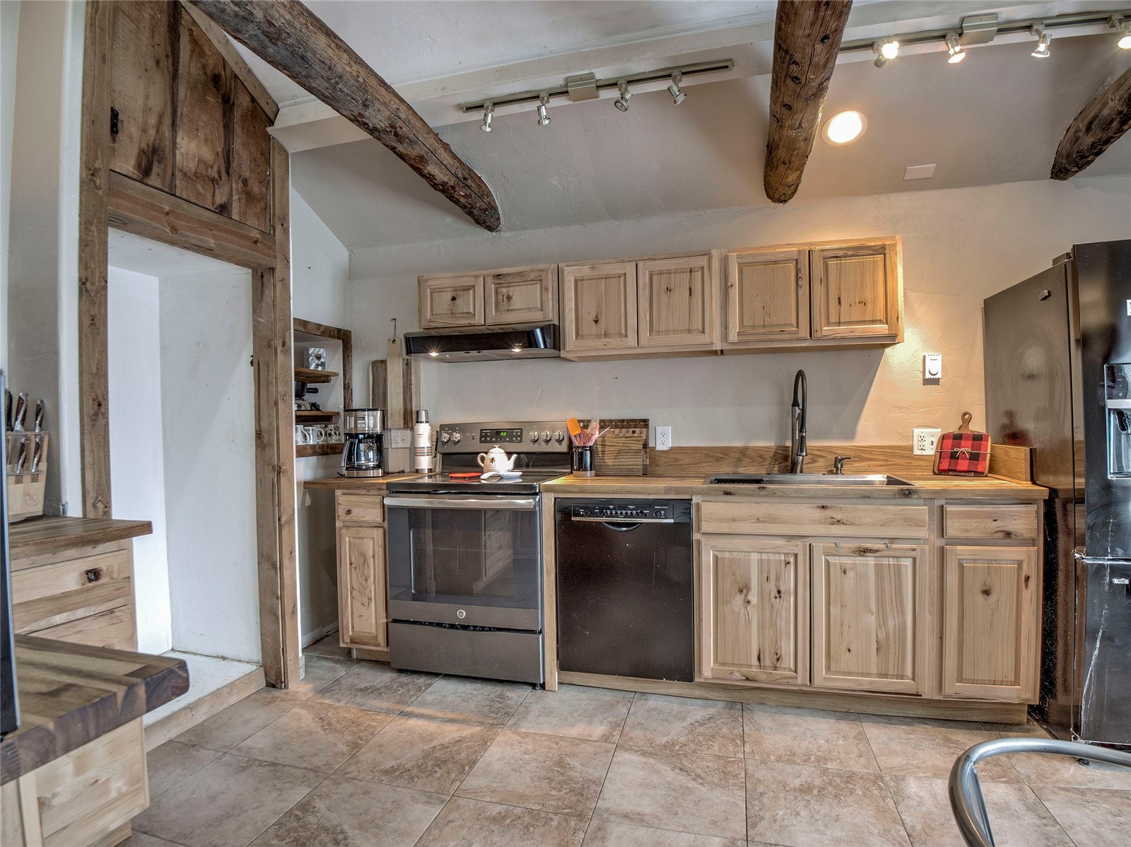 46 Singleton Road Alma, CO 80420 - Photo 11 of 50 a kitchen with stainless steel appliances granite countertop a stove and a sink