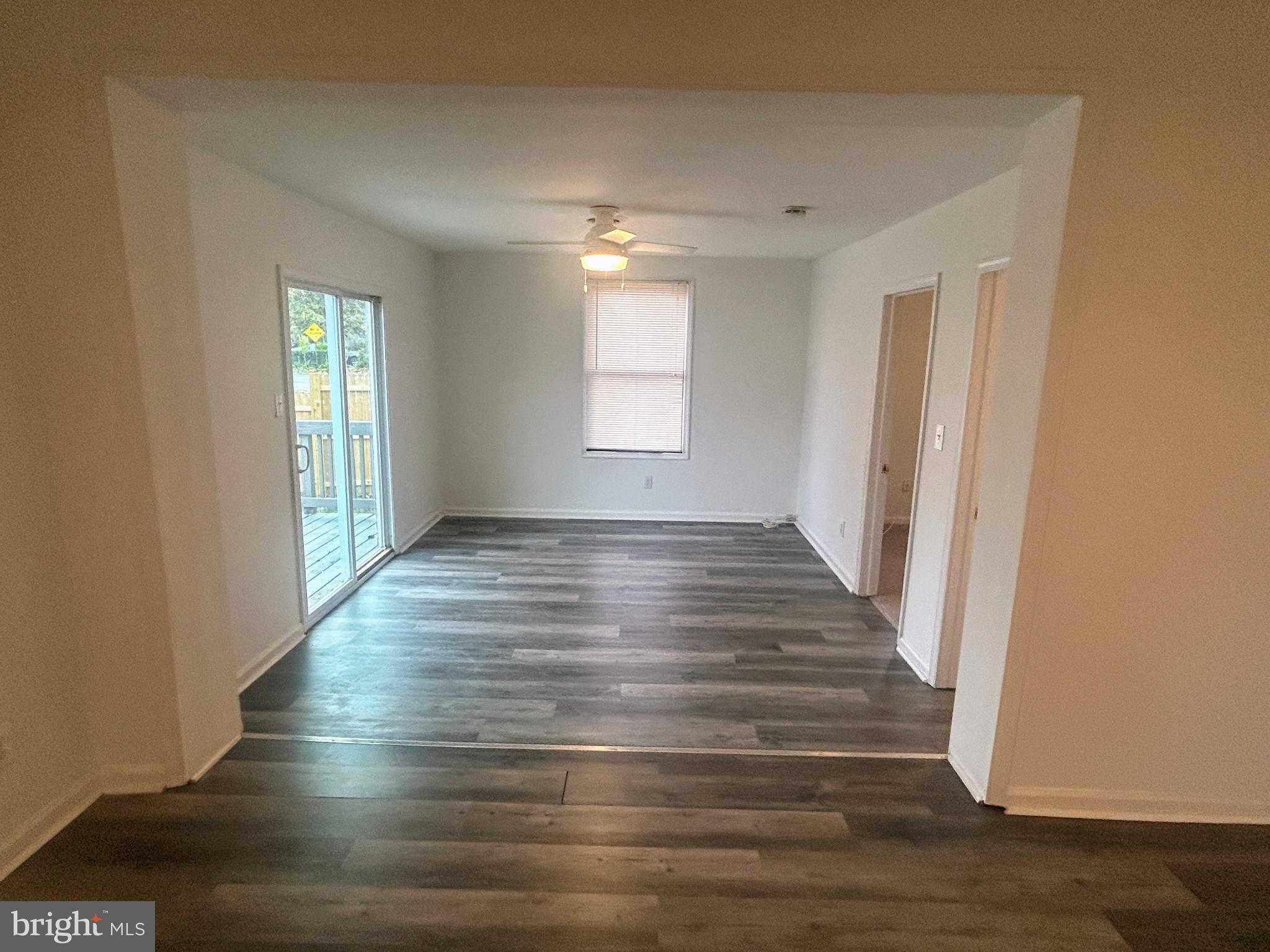 787 Pennsylvania Avenue Wallingford, PA 19086 - Photo 11 of 26 a view of an empty room with wooden floor and a window