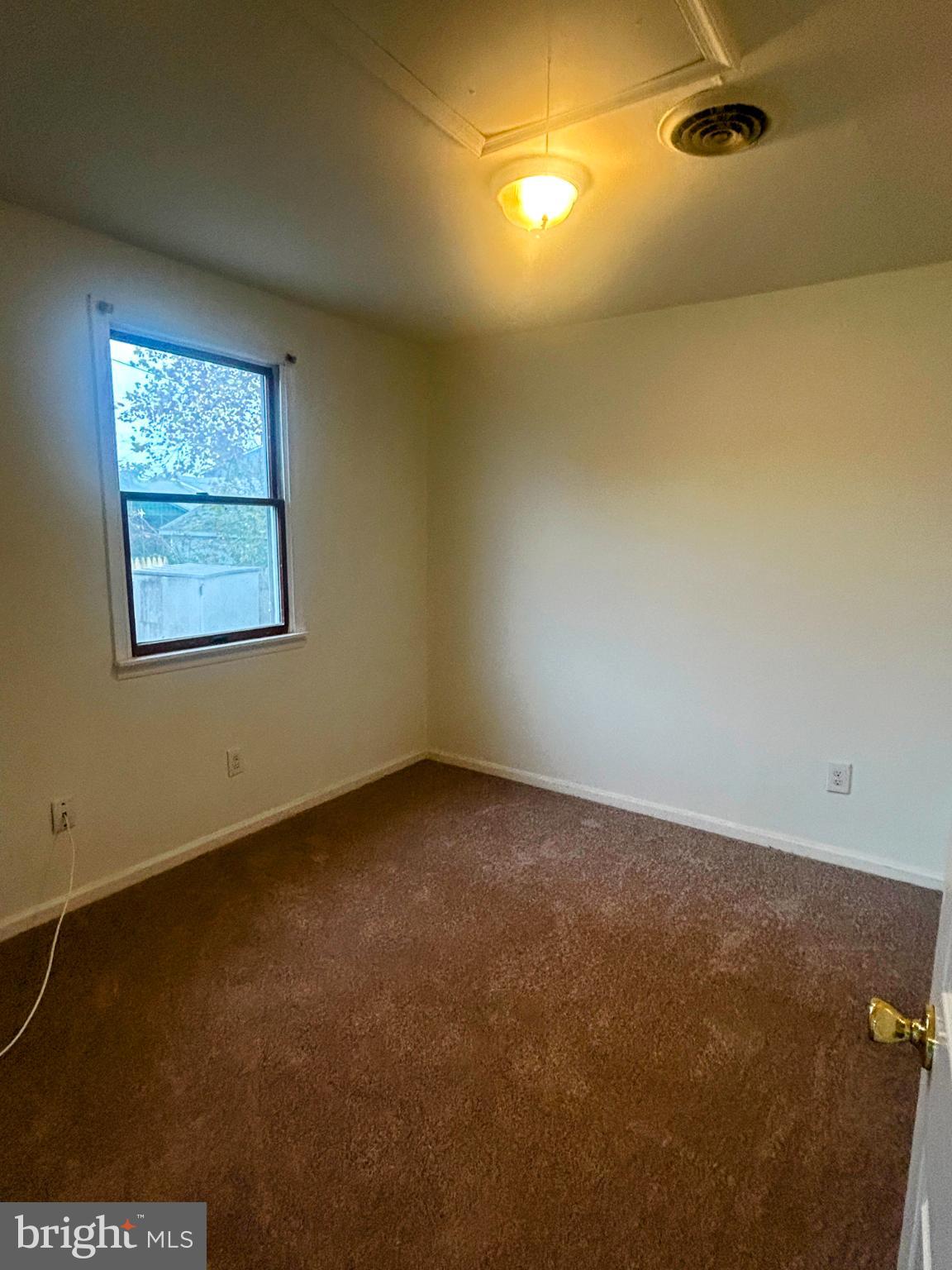 787 Pennsylvania Avenue Wallingford, PA 19086 - Photo 24 of 26 an empty room with windows