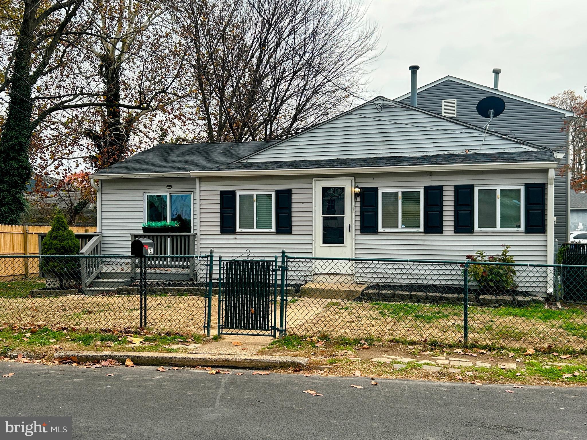 787 Pennsylvania Avenue Wallingford, PA 19086 - Photo 26 of 26 a front view of a house with a yard