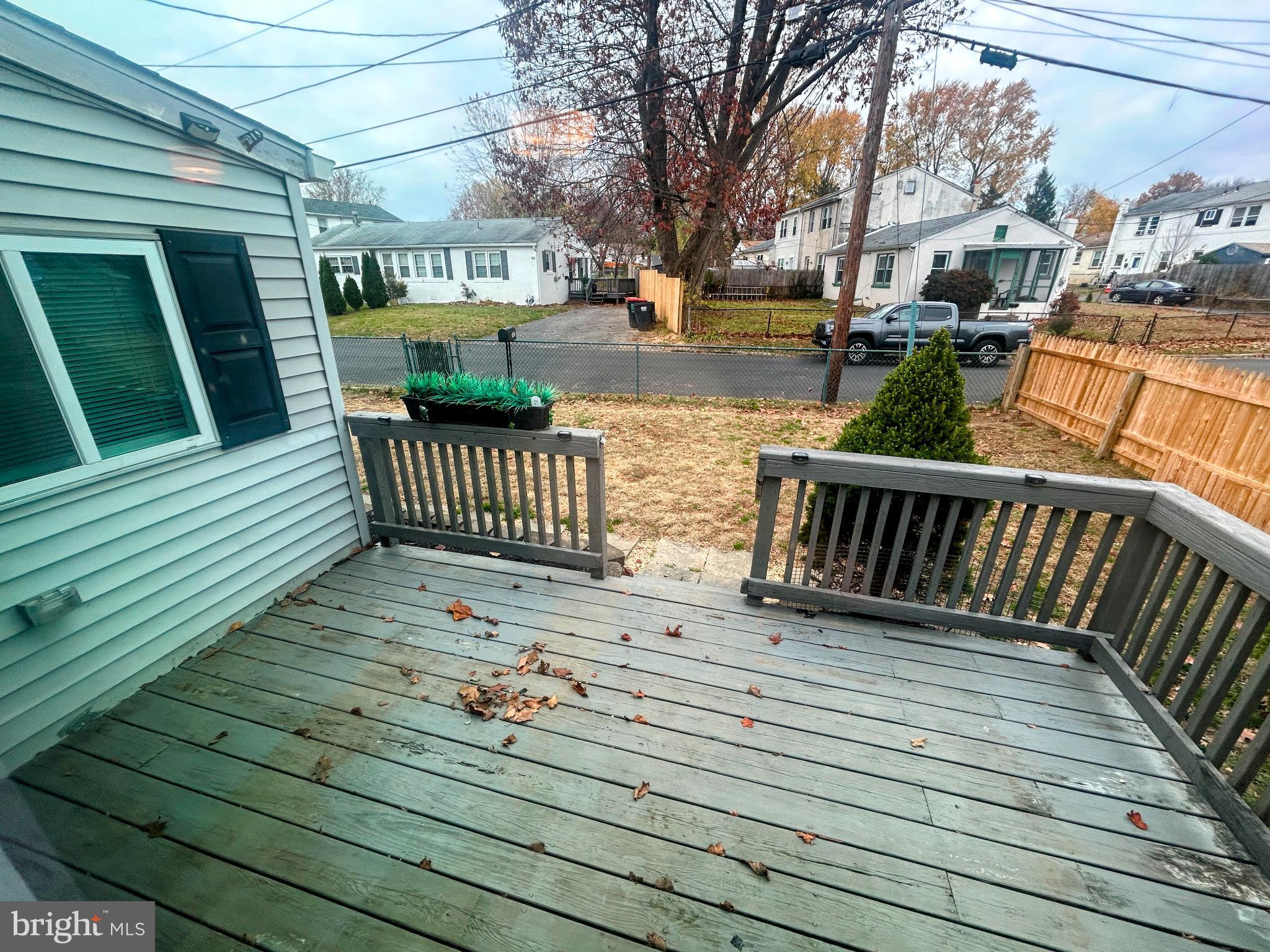 787 Pennsylvania Avenue Wallingford, PA 19086 - Photo 5 of 26 a view of a deck with couches table and chairs