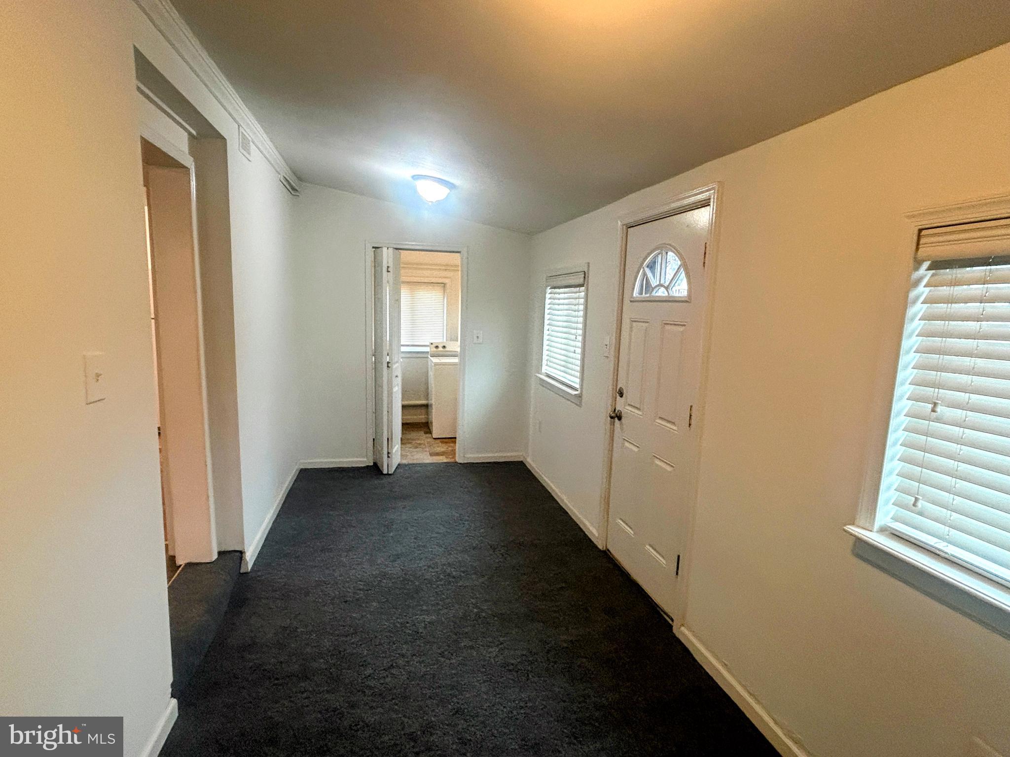 787 Pennsylvania Avenue Wallingford, PA 19086 - Photo 7 of 26 a view of a hallway with windows