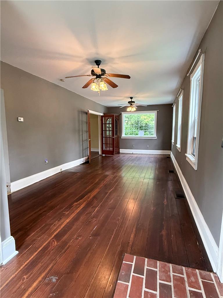 740 Engler Road Nazareth, PA 18064 - Photo 9 of 27 Rich hardwood floors complement this generous living space, perfect for relaxation and gatherings.