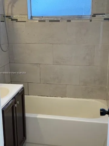 a bathroom with a bathtub