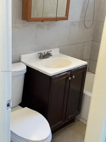 a bathroom with a sink and a toilet