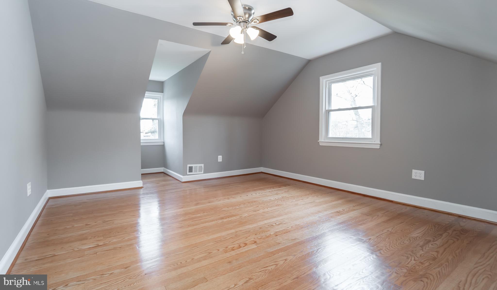7005 Adelphi Road University Park, MD 20782 - Photo 12 of 39 Upper Level 1st Bedroom with Walk-In Closet